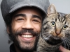 Smiling man with cat
