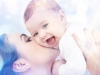 Happy mother with baby