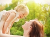 Mother holds daugher