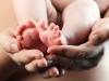 Baby's foot in mother hands