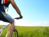Young man riding on bicycle