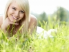 Young woman resting in the grass