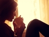 Girl with her hot cup