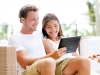 Couple looking at tablet