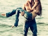Guy holds his girlfriend