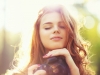 Young woman with camera