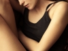 Young woman curled up