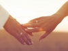 Wedding couple holding hands