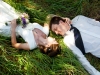 Wedding couple lying in grass