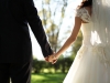 Newlyweds holding hands
