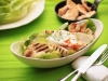 Chicken Caesar salad with poached egg