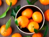 Tangerines on wooden background