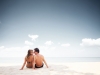 Young happy couple on the beach