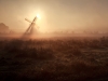 Sunshine behind windmill
