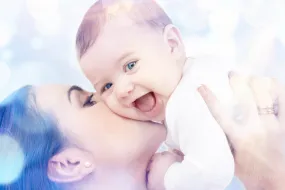 Happy mother with baby