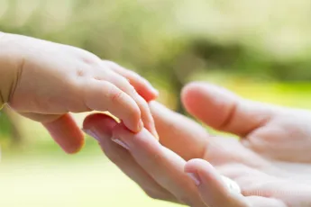 Mother and baby's hands