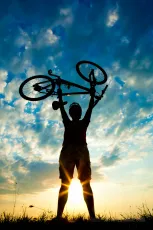 Biker holds bike