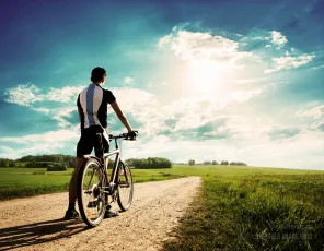 Young man with bicycle