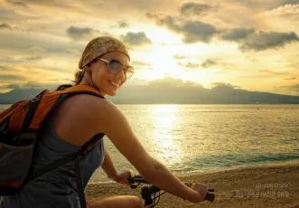 Young woman biking