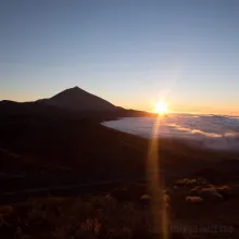 Sunset over the clouds
