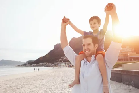 Son on father's shoulders