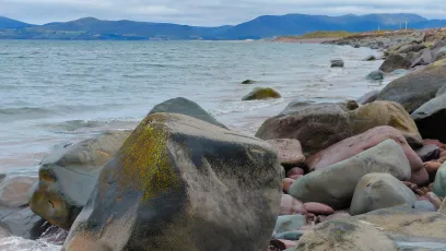 Rocky Shore with Mountains