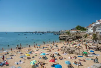 Sunny Beach Day with Coastal Town and Harbour