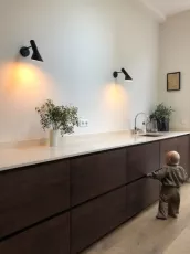 Minimalist modern house in Amsterdam, wooden cabinets Profile from ReformCPH, lamps Louis Poulsen and Artwork Edith Beurskens