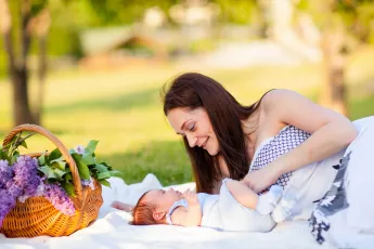 Mother smiling at baby