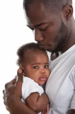 Father holding baby