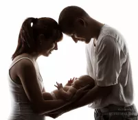 Family with newborn baby