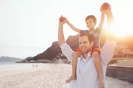 Son on father's shoulders