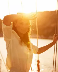 Beautiful woman on yacht deck