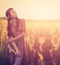 Posing on the field in glowy sunlight