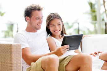 Couple looking at tablet