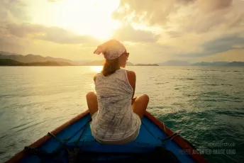 Woman traveling by boat