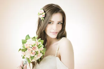 Young beautiful bride with a wedding bouquet