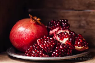 Pieces and grains of ripe pomegranate