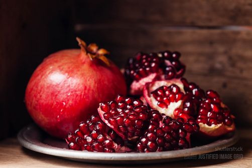 Pieces and grains of ripe pomegranate