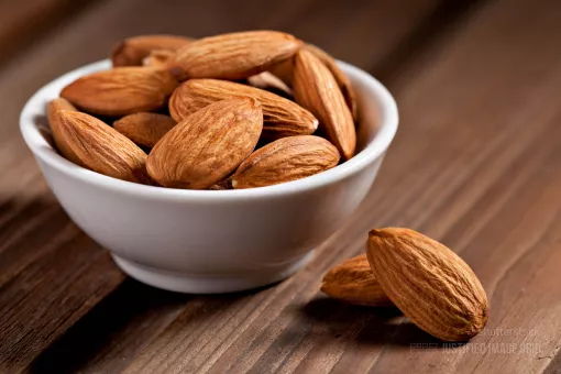Almonds in a small cup