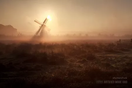 Sunshine behind windmill