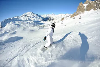 Woman snowboarding