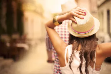 Couple riding a bicycle in the city