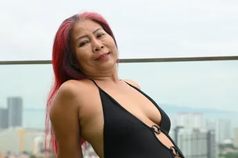 DSC_2439: a woman with red hair wearing a black one piece swimsuit