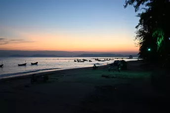 DSC_8314: Twilight calm, fishing boats rest off the shore as the last colors of sunset fade into evening.