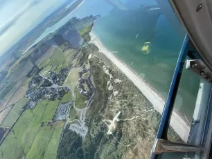 Helicopter flight over Bamburgh Castle, Northumberland.