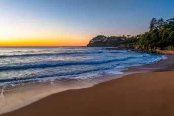 Sunrise at the seaside with a cloudless sky