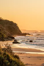 The sun rises over the NSW, Australia coastline
