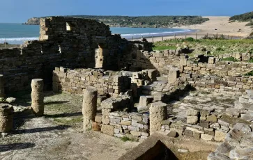 Baelo Claudia Roman ruins with Bolonia Beach and 30m sanddune, Costa de la Luz, Spain