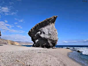 Iconic rock of Los Muertos beach
